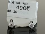 a tag with a price tag attached to it on a table