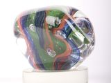 a glass sculpture of a fish on a clear base
