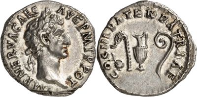 a silver coin with an image of a woman on it