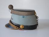 a hat with a chain around it on a table