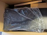 a box that has a laptop in it in it