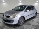a picture of a silver car parked in a garage