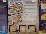 three board games sitting on top of a table next to each other