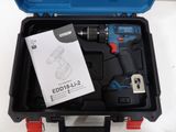 a box with a drill and a screwdriver in it