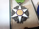 a medal that is sitting in a box on a table