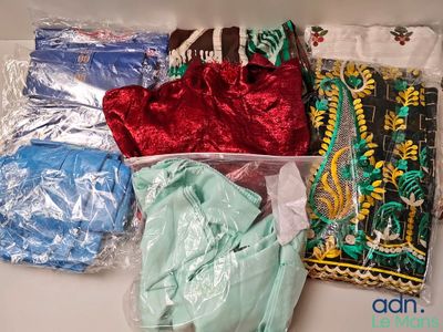 many different types of clothing in a plastic bag
