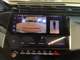 a picture of a car dashboard with a camera on it