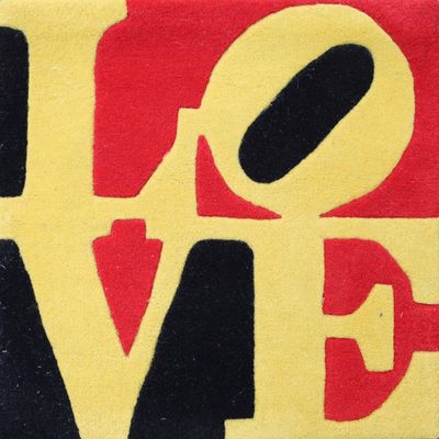 a picture of a painting of the word love in red, yellow, and black