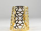an image of a gold cuff with a geometric design on it