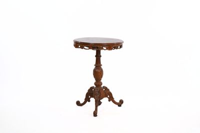 an old wooden table with a marble top on a white background