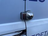 a close up of the door handle of a van