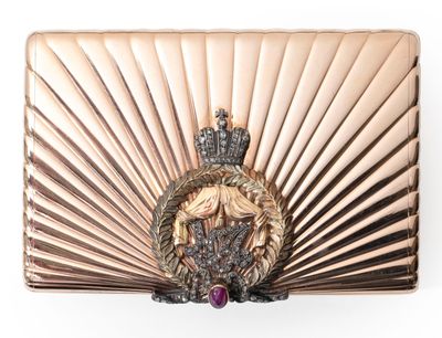 an image of a gold purse with a crown on top of it