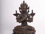 bronze statue of the hindu goddess sitting on a lotus