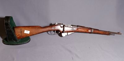 a close up of a toy gun on a white background