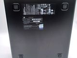 the back of a laptop with a battery attached to it