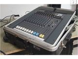 a black and silver sound board sitting on top of a case