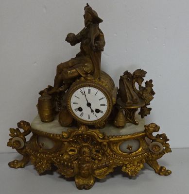 a clock that is sitting on top of a table