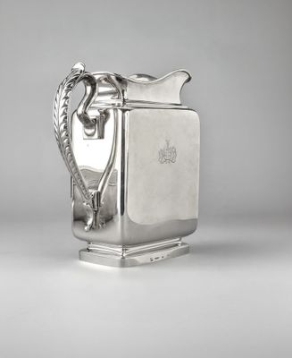 an antique silver plated teapot with a handle and handle