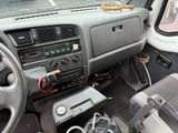 a car dashboard with a bunch of electronics in it