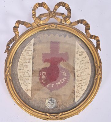 a picture of a picture of a cross in a gold frame