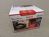 the box is open on the table with the contents in it