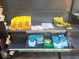 a lot of cigarettes on the shelves in the store