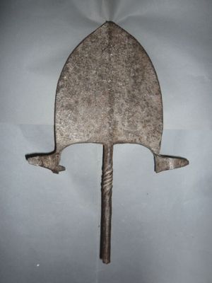 an image of a metal object on a white surface