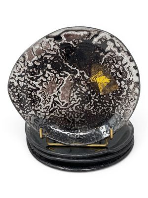 black and white snow globe with a yellow star on top