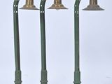 three green street lights on a white background