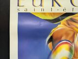 a picture of a poster of a soccer player on the wall