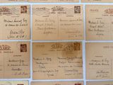 several old envelopes are lined up on top of each other