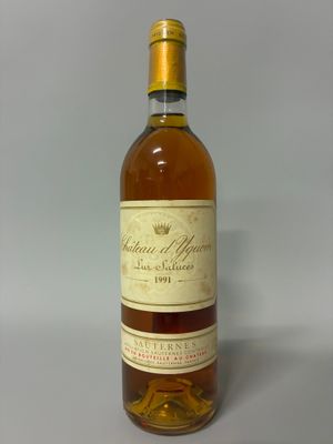 a close up of a bottle of wine on a table