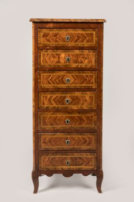 a wooden chest of drawers with four drawers on each side