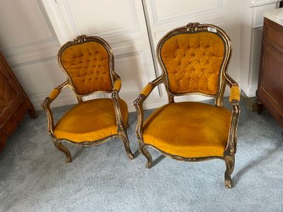 pair of antique chairs with gold upholstered upholstered cushions
