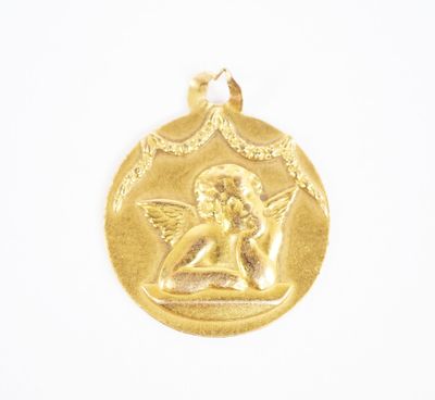an image of a gold pendant with an angel on it