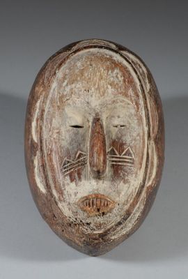 an image of a wooden mask on a white background