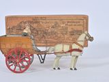 a toy horse pulling a carriage with a wooden box on the back