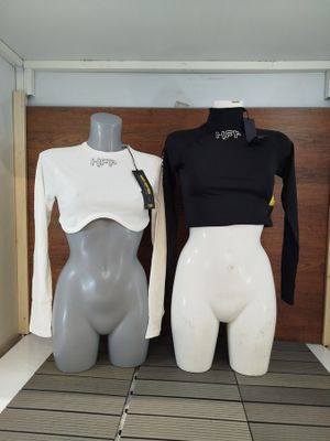 two mannequins on display in a room