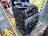 a pile of electronic equipment sitting on top of a pallet