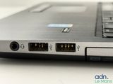a close up of a laptop with two ports on it
