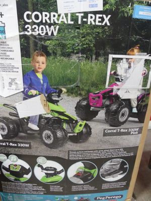 a box with a picture of a child riding on a quad bike