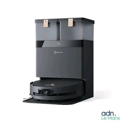une image représentant une machine à café surmontée d'une cafetière