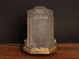 a light that is sitting on a wooden table