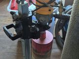 a machine that is sitting on the floor next to a chair