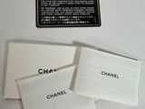 three business cards sitting on a table next to each other