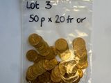 a bag of gold coins sitting on a table