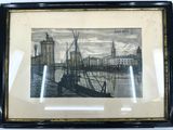 framed picture of a picture of a city with a bridge in the background
