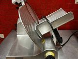 an image of a slicer sitting on a table in a kitchen
