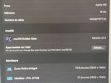 an image of a cell phone with the macbook pro on the screen