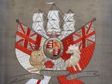 une image représentant un blason, un drapeau et un chat